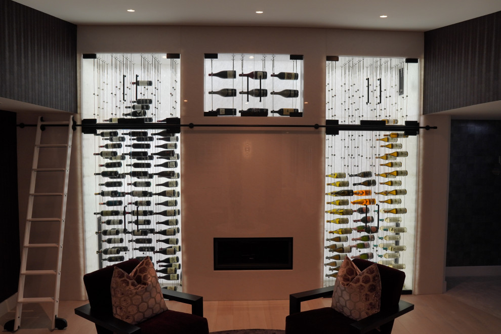 This is an example of a midcentury wine cellar in Orange County.