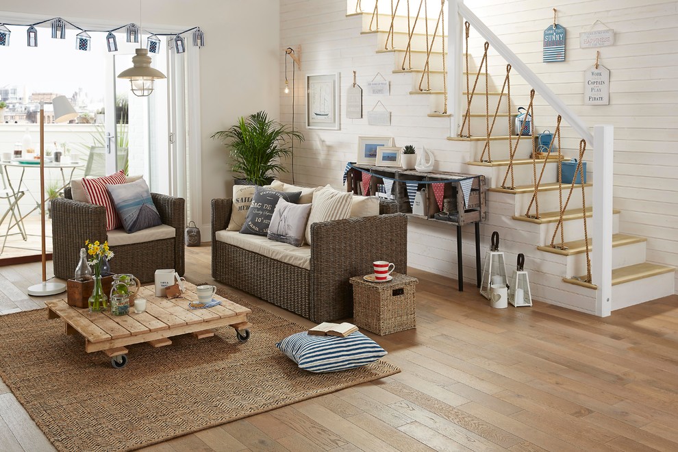 This is an example of a beach style living room in Hampshire.