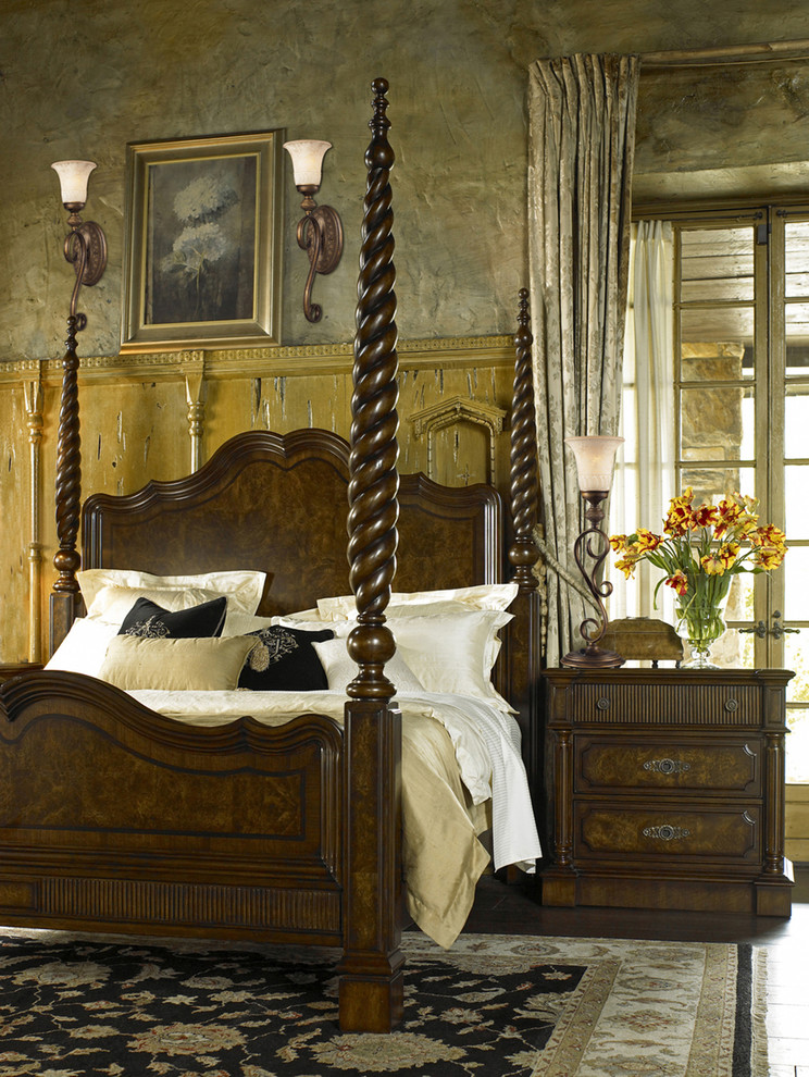 Inspiration for an expansive master bedroom in New York with beige walls and medium hardwood floors.