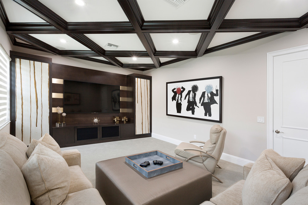 Inspiration for an expansive contemporary open concept home theatre in Miami with beige walls, carpet, a built-in media wall and beige floor.