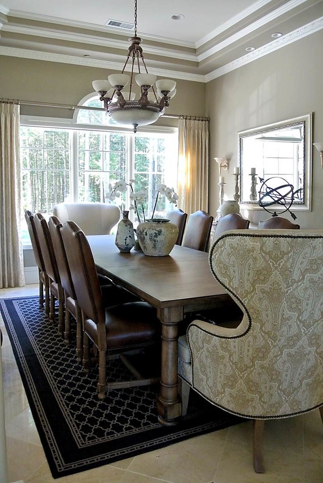 Large transitional separate dining room in Seattle with grey walls, travertine floors and no fireplace.