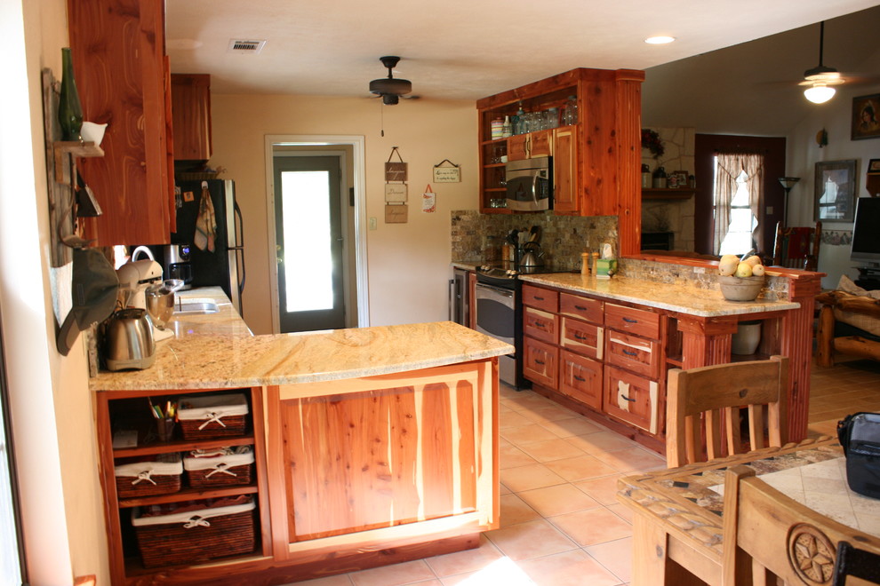 Example of a mountain style kitchen design in Austin