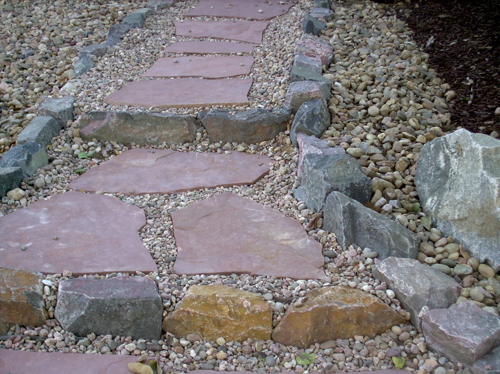 Inspiration for a rustic landscaping in Denver.