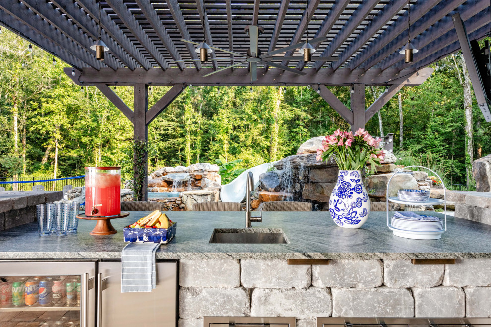Example of a mountain style patio design in Jacksonville