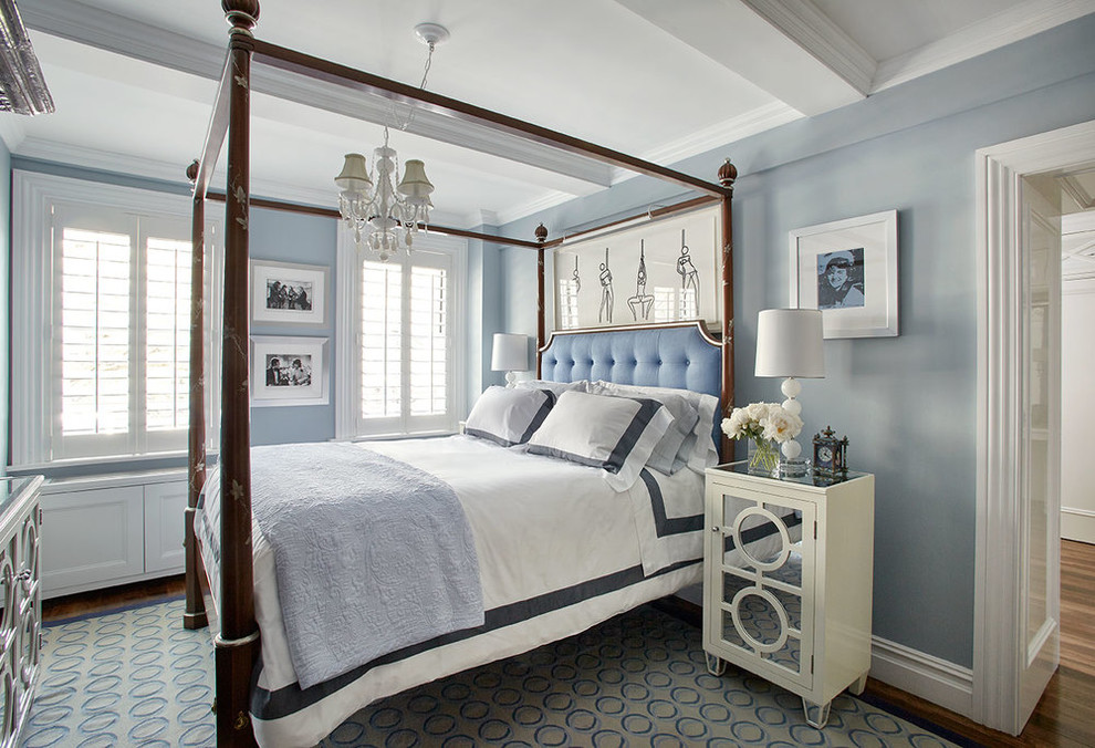 Bedroom - traditional dark wood floor and blue floor bedroom idea in New York with blue walls