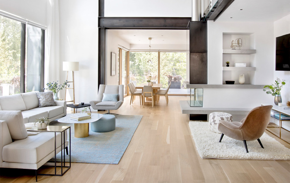Inspiration for a mid-sized contemporary formal enclosed living room in Denver with white walls, medium hardwood floors, no fireplace and no tv.