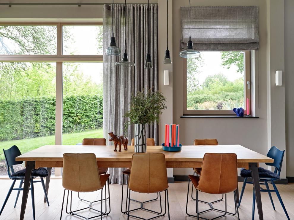 Eclectic dining room in Surrey.
