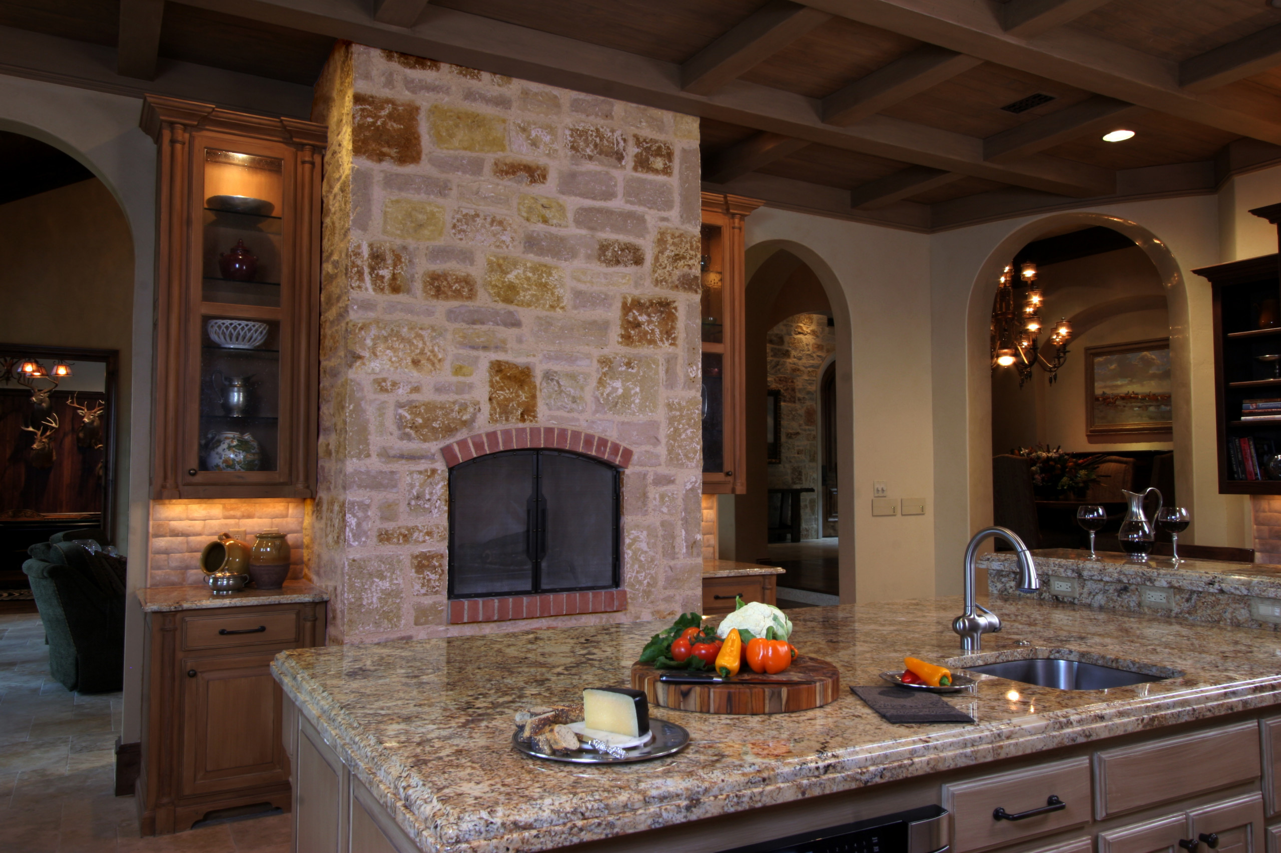 Natural Tuscan Inspired Kitchen - View of Fireplace