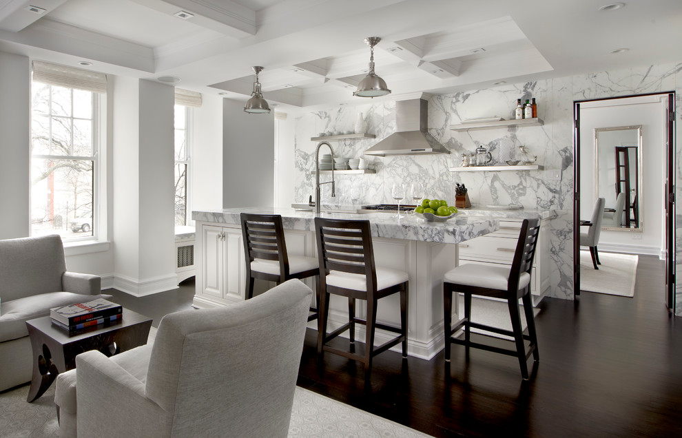 Example of a transitional dark wood floor kitchen design in Chicago with raised-panel cabinets, marble countertops, white backsplash, stone slab backsplash and an island