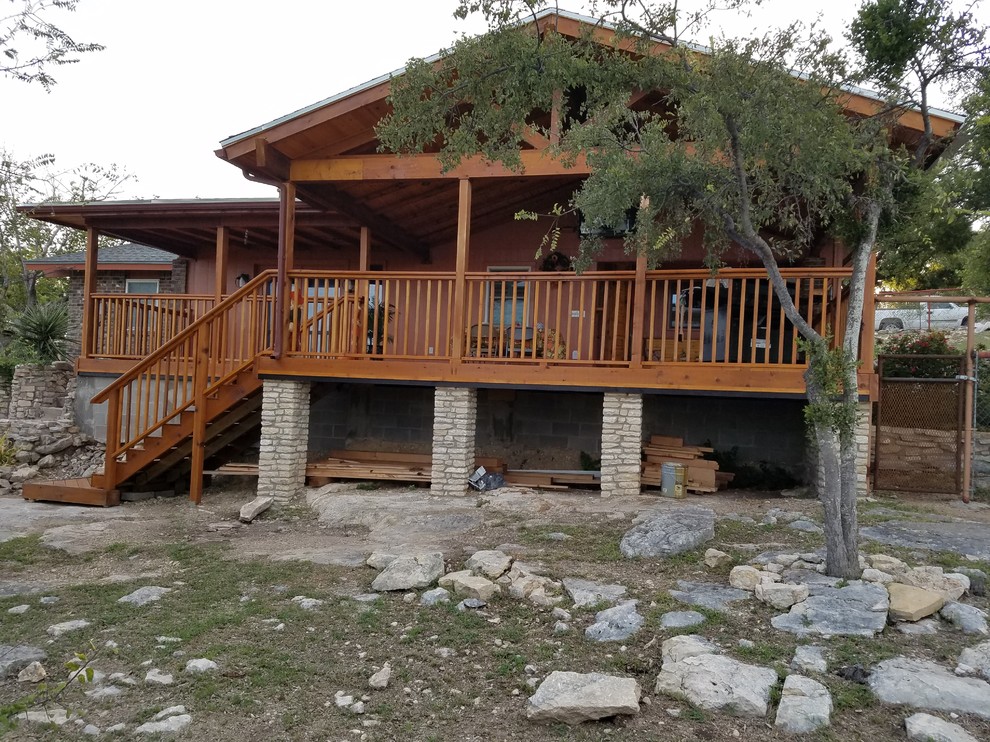 Inspiration for a rustic home design remodel in Austin