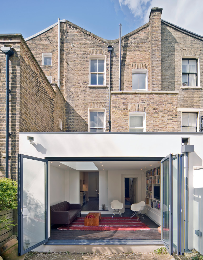 This is an example of a contemporary one-storey exterior in London with a flat roof.