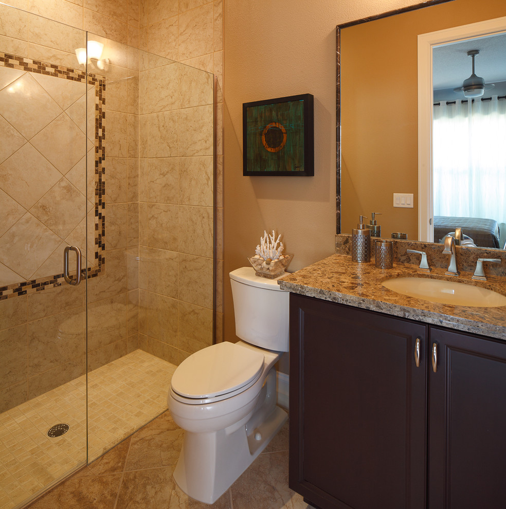 This is an example of a transitional bathroom in Orlando with raised-panel cabinets, medium wood cabinets, a drop-in tub, a corner shower, beige tile, ceramic tile, beige walls, porcelain floors, a vessel sink, soapstone benchtops, beige floor and an open shower.