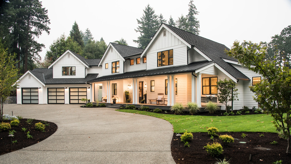 Design ideas for a country two-storey white house exterior in Seattle with a gable roof and a shingle roof.