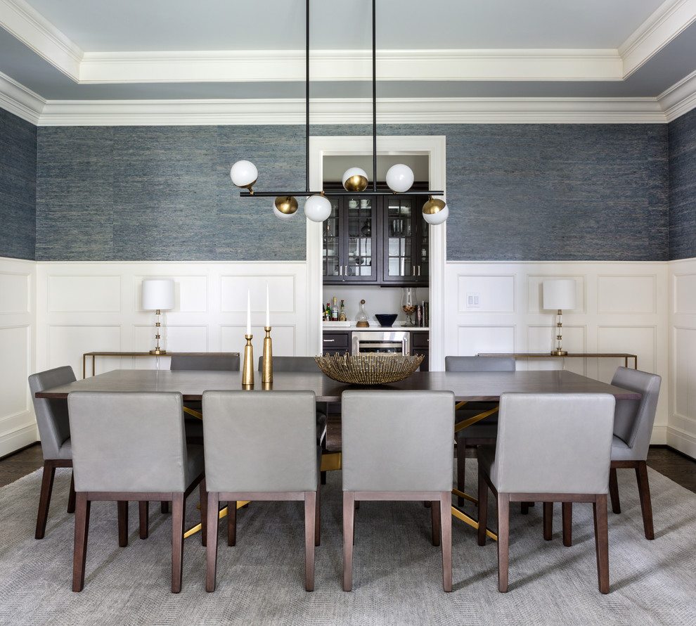 Inspiration for a transitional dark wood floor and brown floor dining room remodel in DC Metro with blue walls