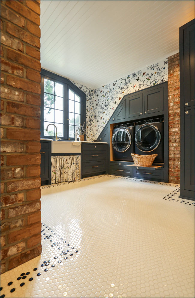 Large traditional u-shaped dedicated laundry room in Portland with an undermount sink, shaker cabinets, blue cabinets, marble benchtops, multi-coloured walls, porcelain floors, a side-by-side washer and dryer, multi-coloured floor, white benchtop, timber and wallpaper.