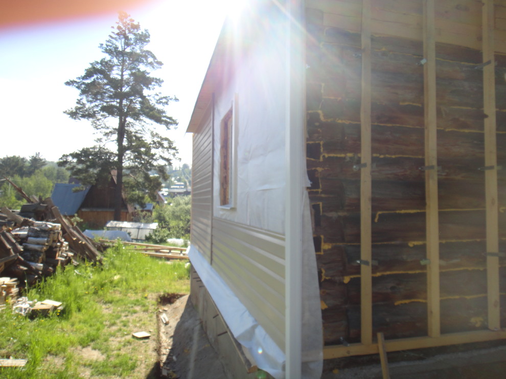 Отделка дома рядом с баней