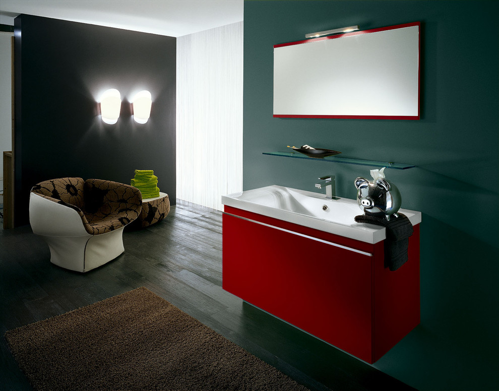 Modern bathroom in Los Angeles with a wall-mount sink, flat-panel cabinets and red cabinets.