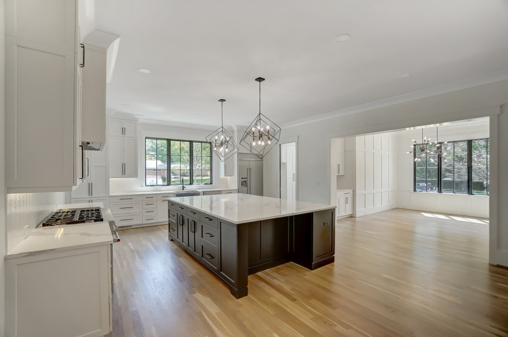 Example of a french country kitchen design in Charlotte