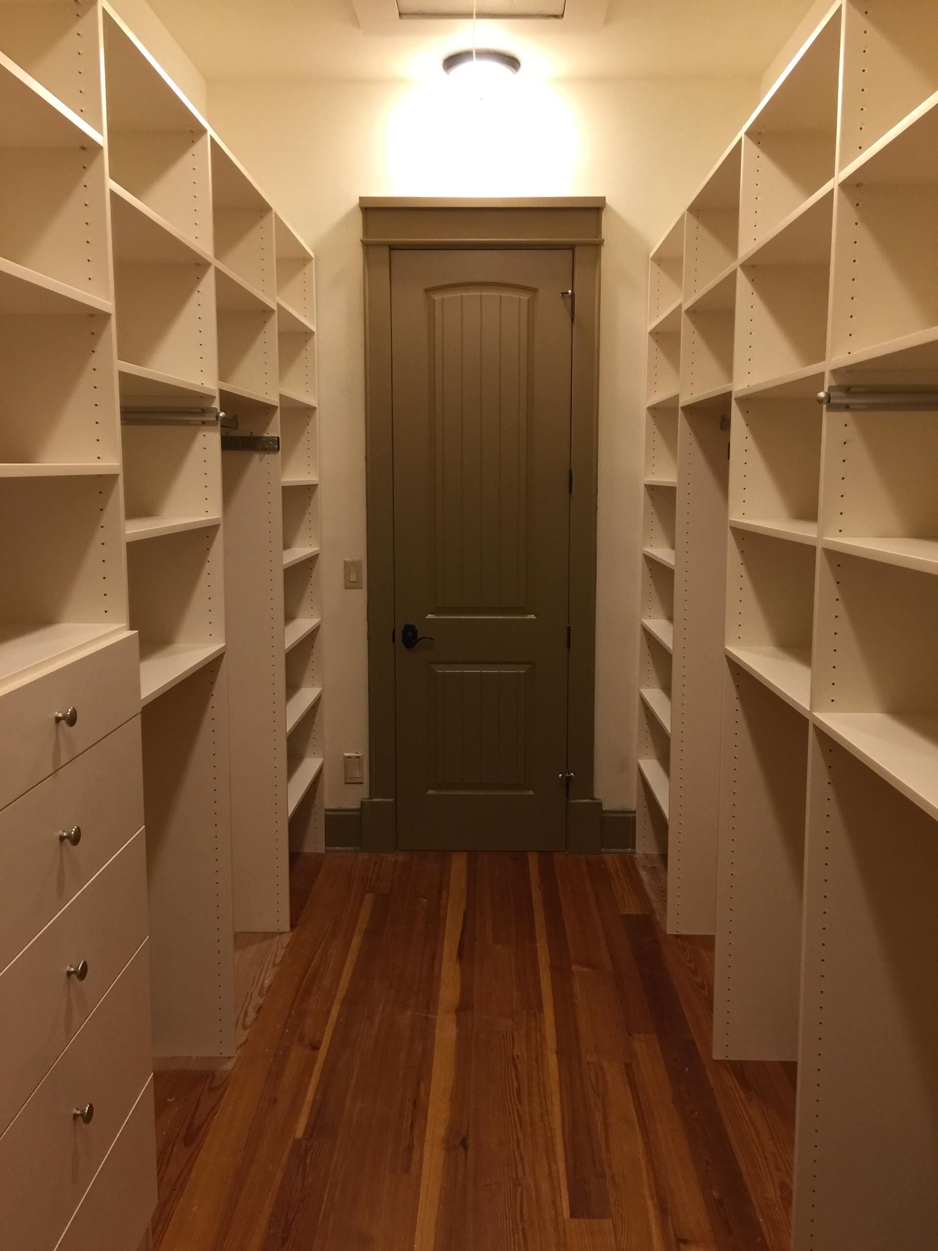 Large and beautiful spaces can make a most useful custom closets! There are adjustable shelves, single and double hanging rods, drawers and a tilt out hamper. This was installed in just one day!