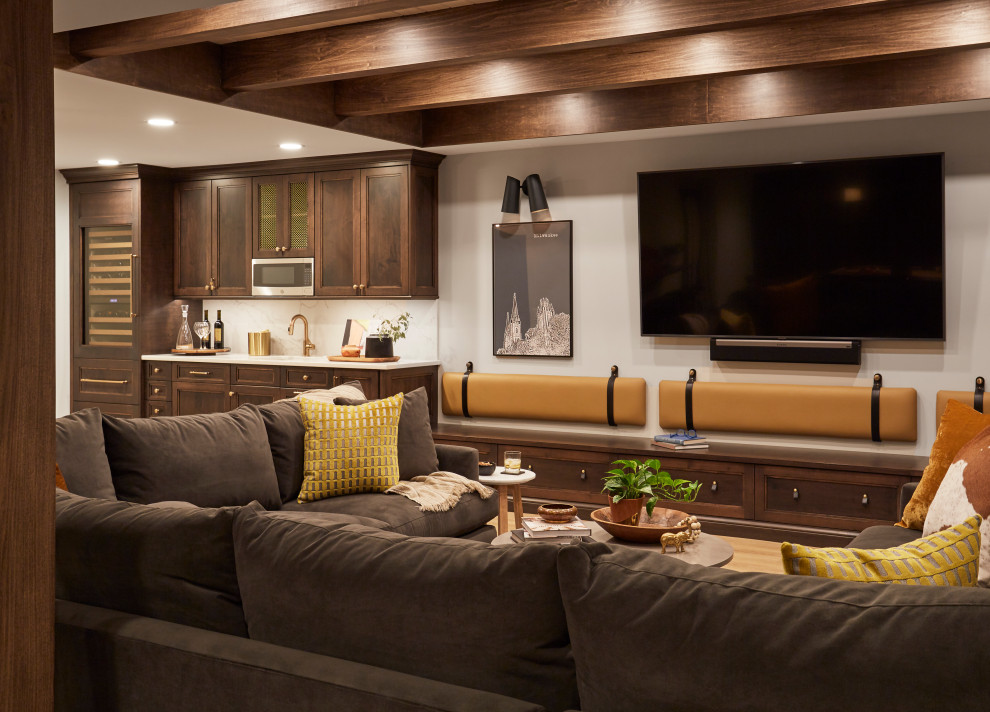 Inspiration for a transitional family room in Chicago with white walls and exposed beam.