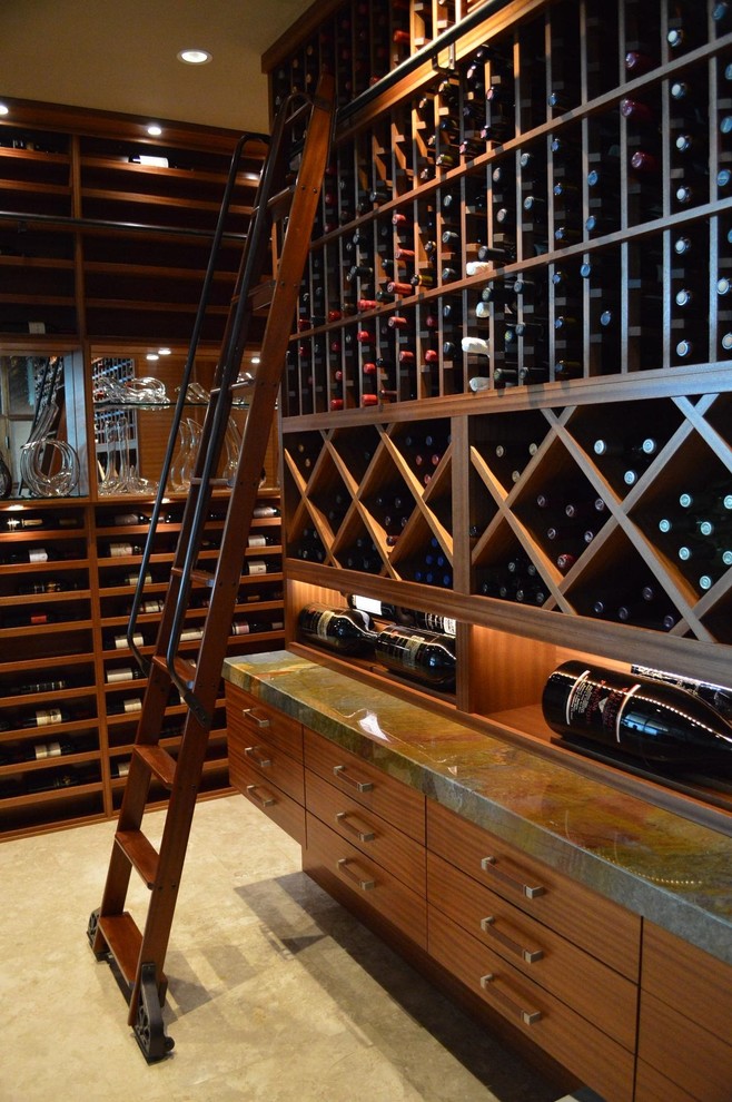 Design ideas for a large modern wine cellar in San Diego with terra-cotta floors and display racks.