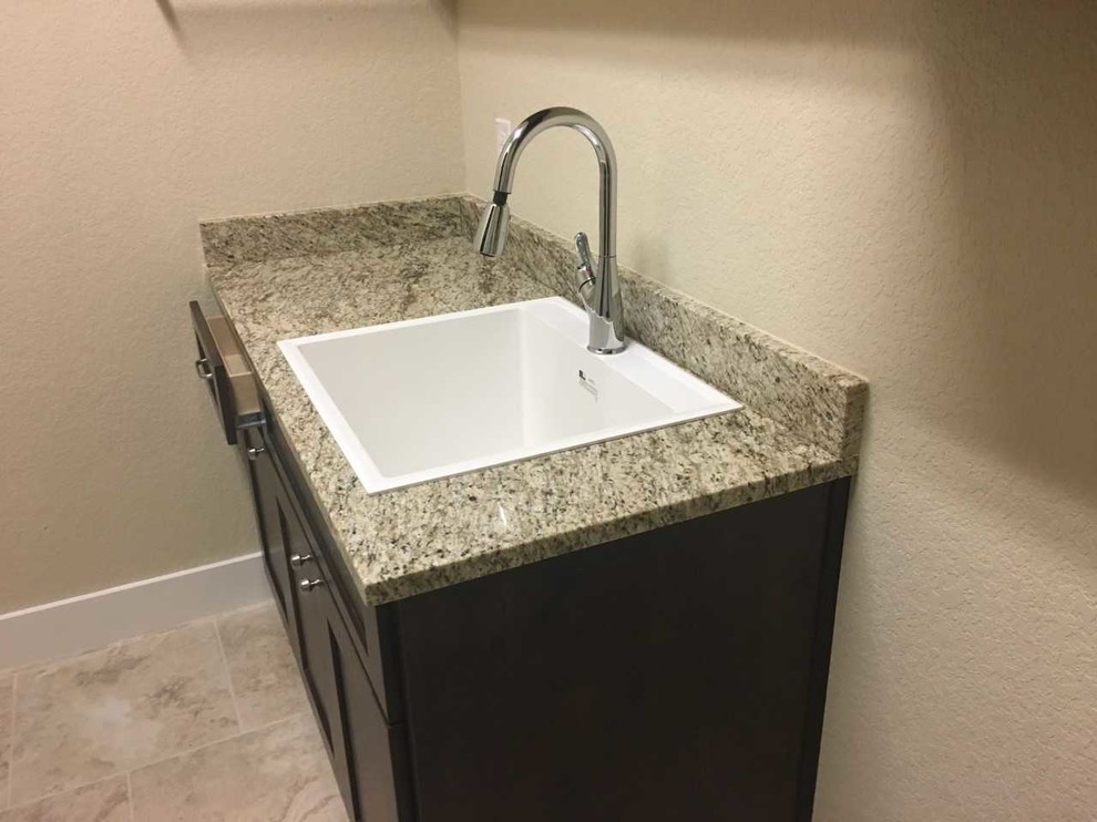 Inspiration for a transitional laundry room remodel in Austin