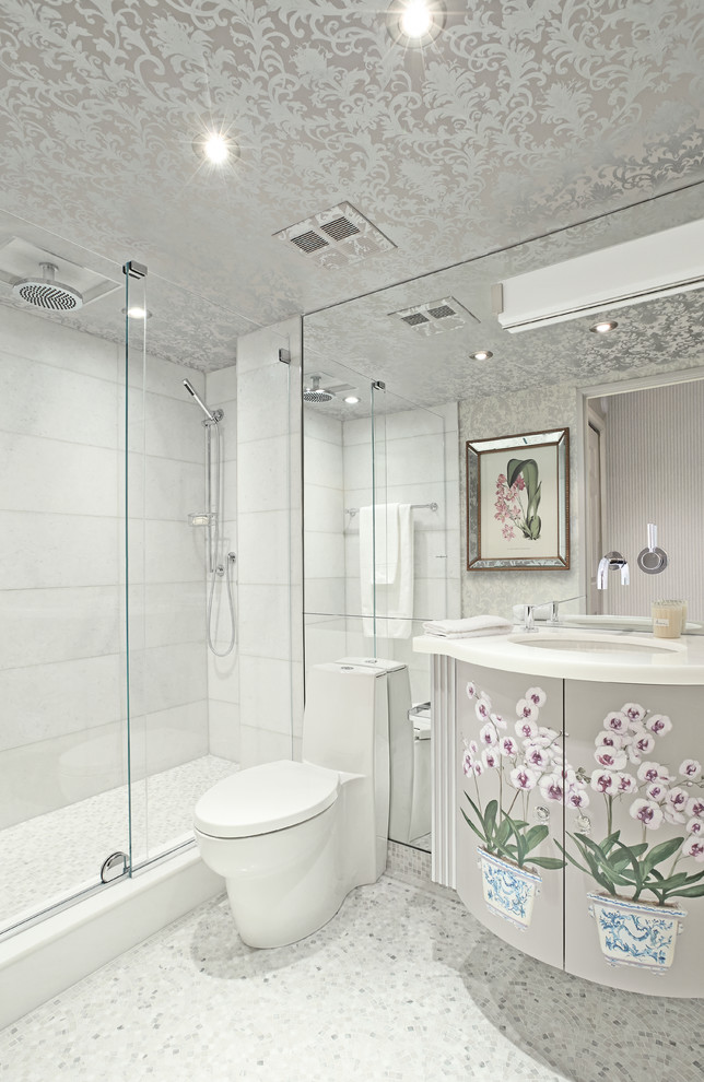 Mid-sized traditional 3/4 bathroom in Toronto with furniture-like cabinets, grey cabinets, an alcove shower, a one-piece toilet, white tile, stone tile, grey walls, mosaic tile floors, an undermount sink and marble benchtops.