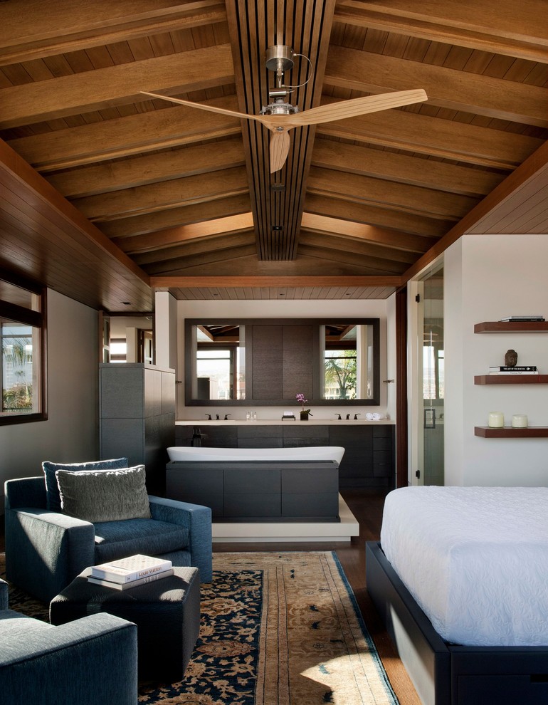 Bedroom - contemporary master dark wood floor bedroom idea in Orange County with white walls