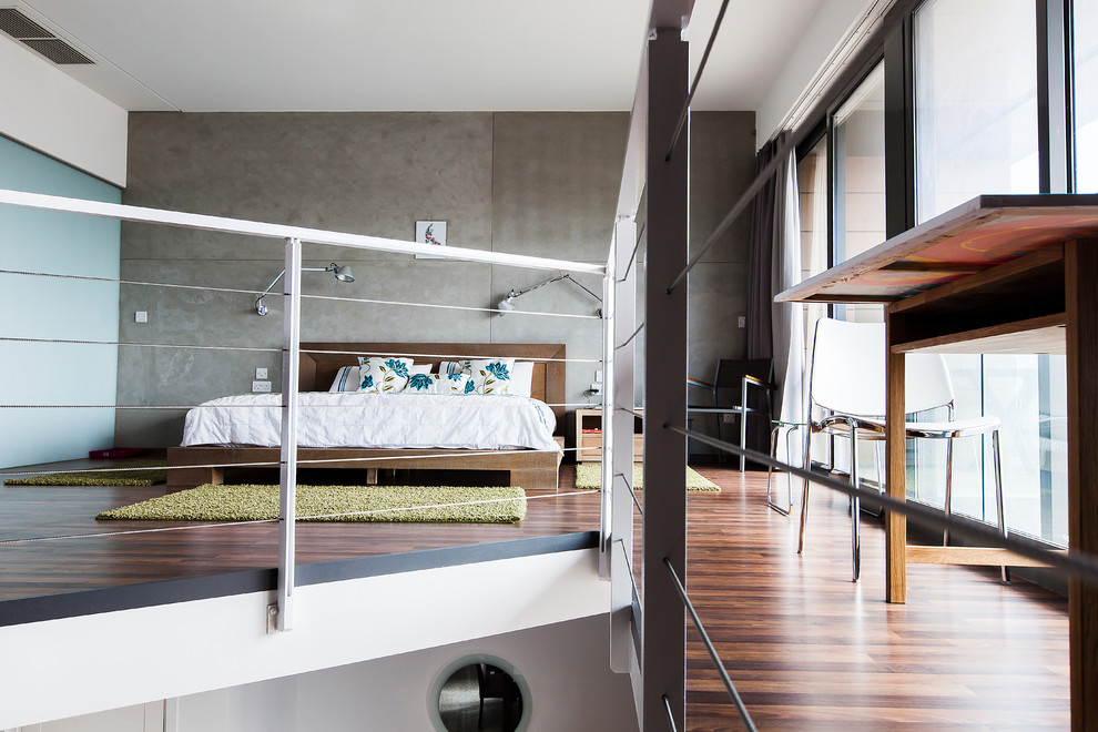 Inspiration for a contemporary loft-style bedroom in Other.