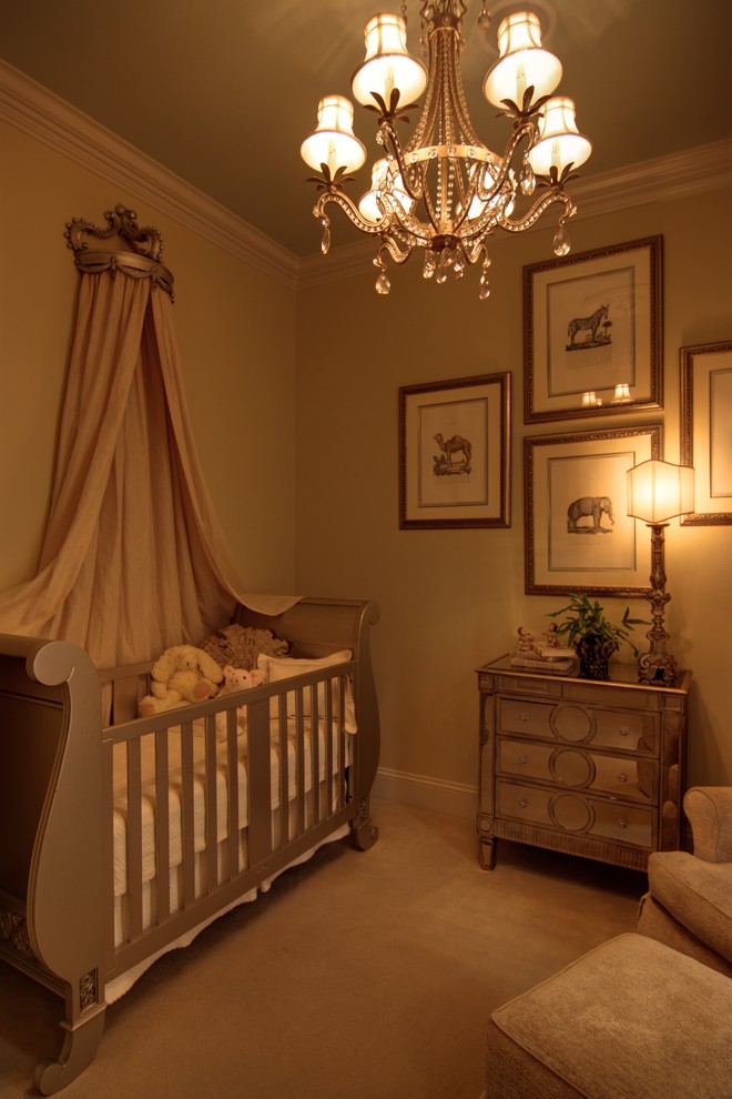 Mid-sized contemporary nursery in New Orleans with beige walls and carpet for girls.