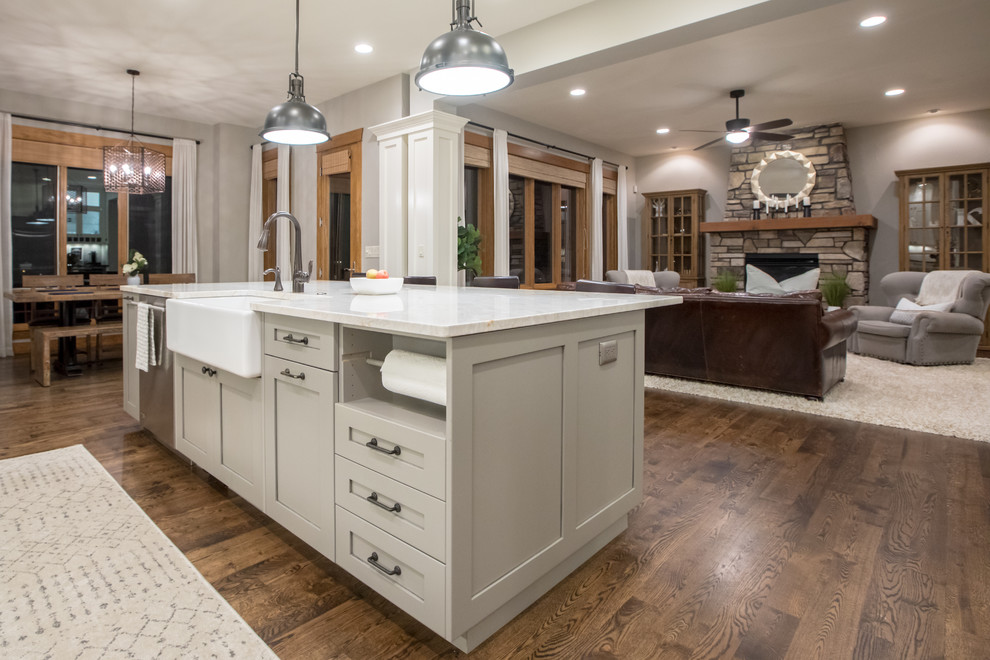 Example of a large transitional l-shaped eat-in kitchen design in Denver