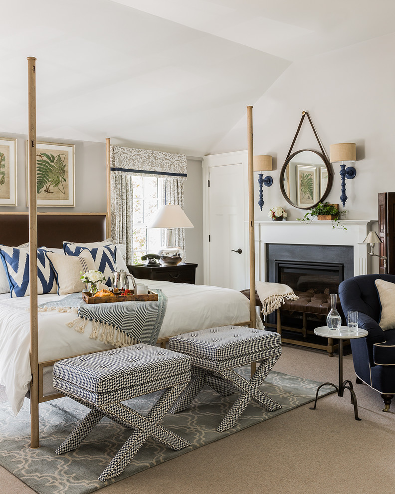 Large elegant master carpeted and beige floor bedroom photo in Boston with gray walls, a standard fireplace and a metal fireplace