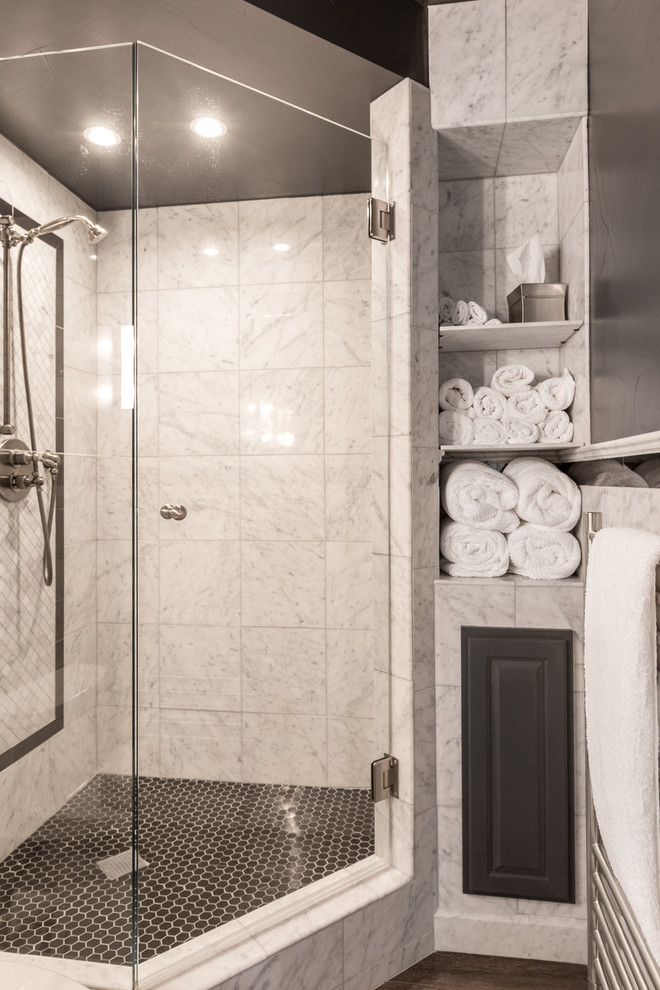 Small traditional master bathroom in Denver with a corner shower, black and white tile, black walls, marble floors, a drop-in tub, a one-piece toilet, stone tile, a drop-in sink and solid surface benchtops.