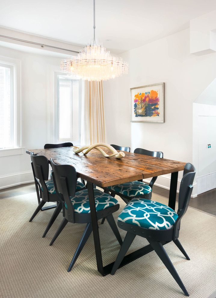 This is an example of a mid-sized eclectic open plan dining in Toronto with white walls, medium hardwood floors, no fireplace and beige floor.