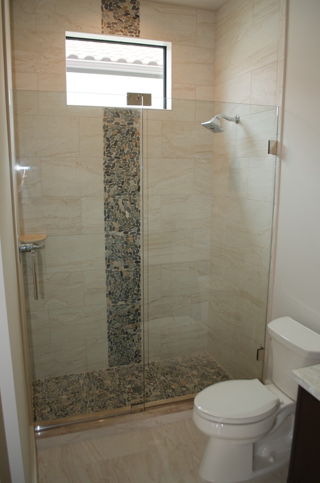 Transitional 3/4 beige tile and ceramic tile ceramic tile and beige floor alcove shower photo with beige walls and a hinged shower door