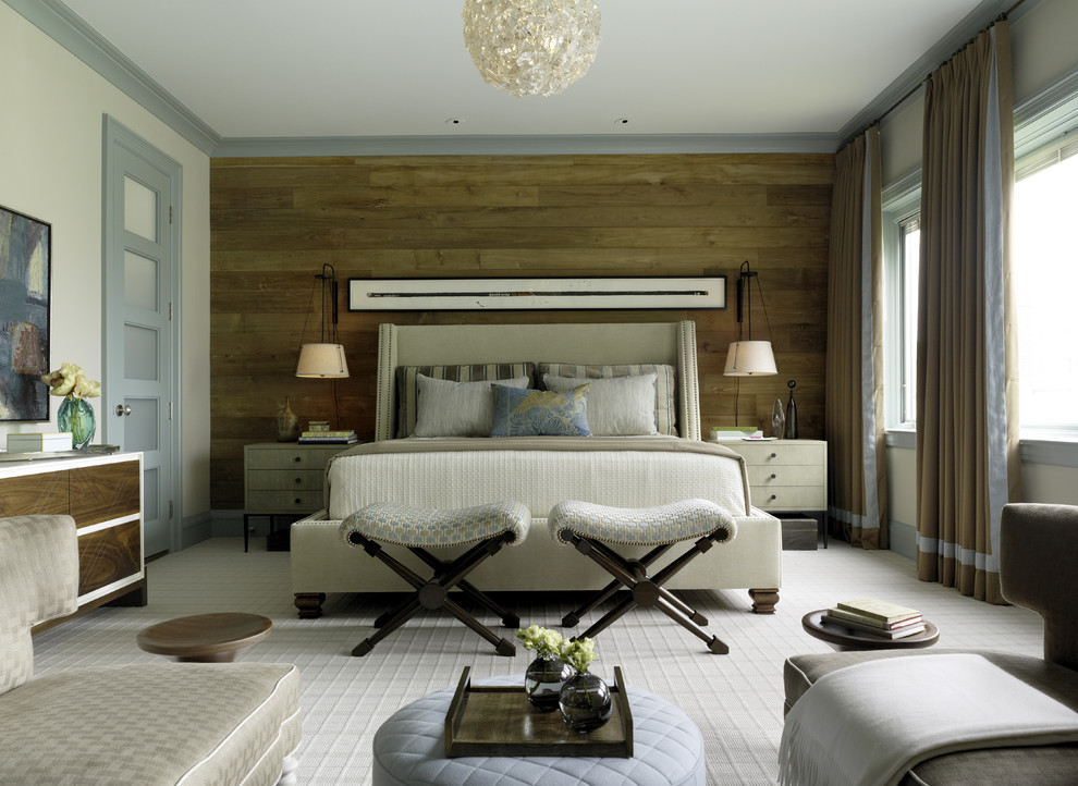This is an example of a contemporary bedroom in San Francisco with beige walls and carpet.