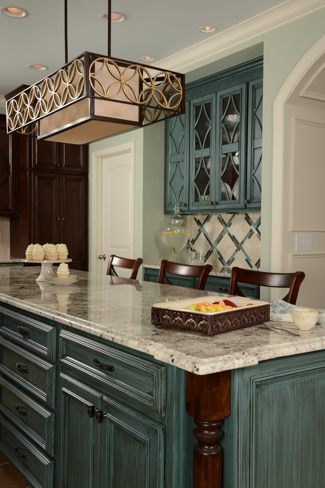 Design ideas for a traditional kitchen in Birmingham with blue cabinets and recessed-panel cabinets.