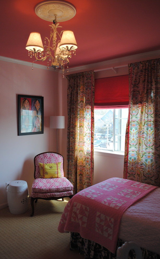 Small eclectic guest bedroom in Philadelphia with pink walls, carpet and no fireplace.