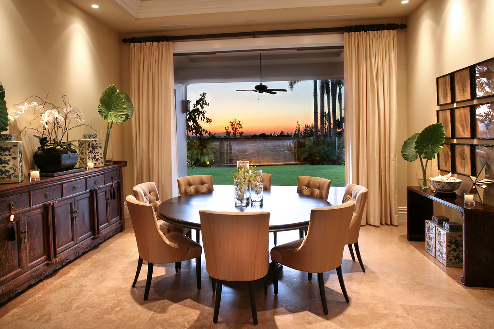 Mediterranean separate dining room in Orange County with beige walls and ceramic floors.