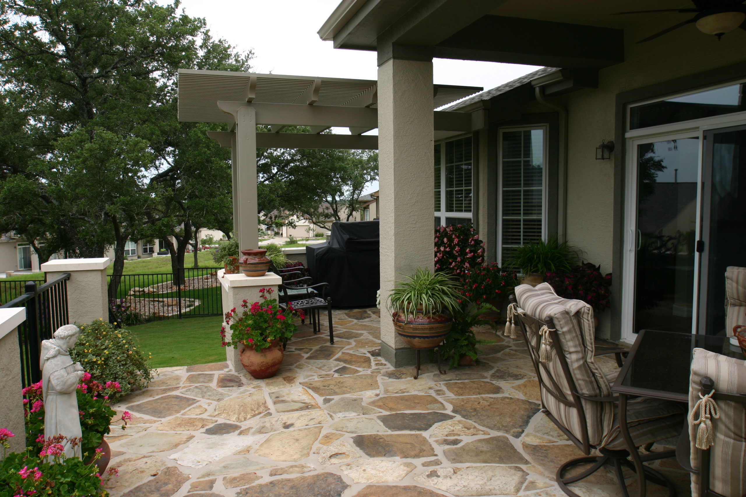 Chocolate / brown flagstone extension w/ stucco seatwalls and columns, Alumawood