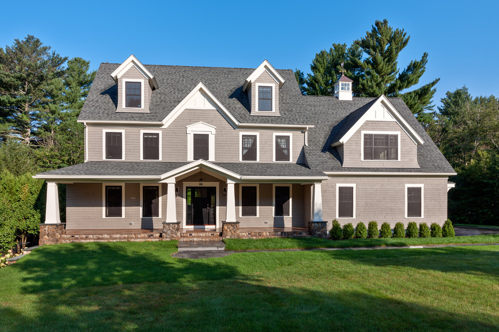 Example of a large arts and crafts home design design in Boston