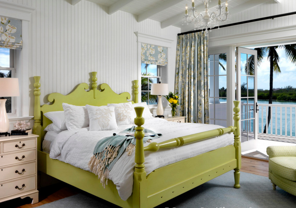 Inspiration for a traditional master bedroom in Miami with white walls.