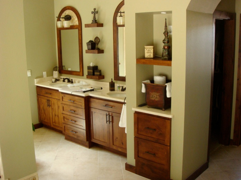 Inspiration for a transitional beige tile bathroom remodel in Austin with raised-panel cabinets and medium tone wood cabinets