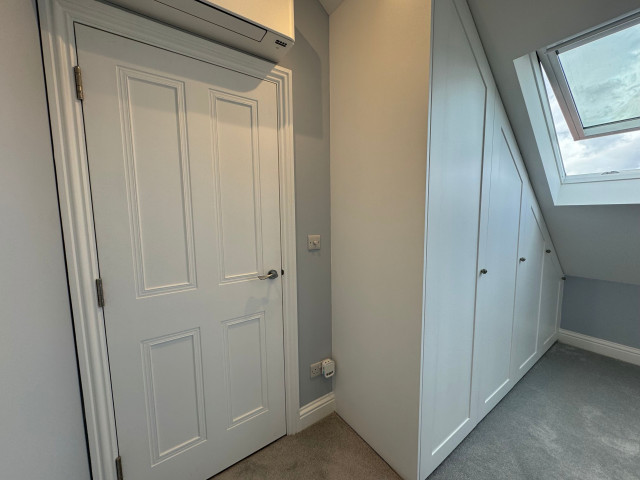 Attic Conversion in West Ealing cabinet