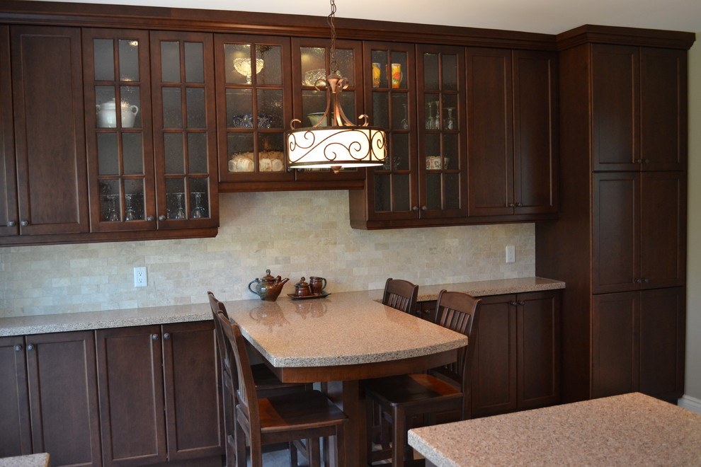 Example of a transitional home design design in Toronto