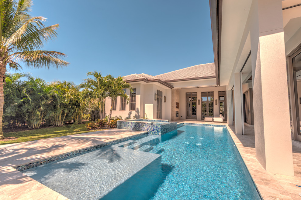 Photo of a transitional pool in Miami.