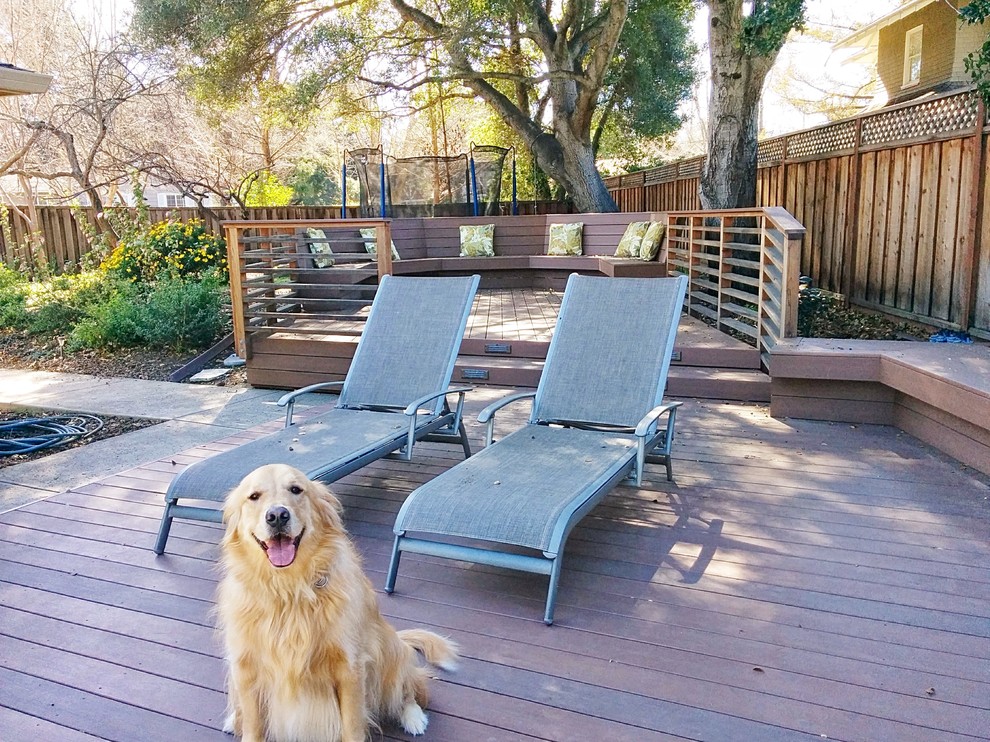 Example of a mid-sized transitional backyard deck design in San Francisco with no cover