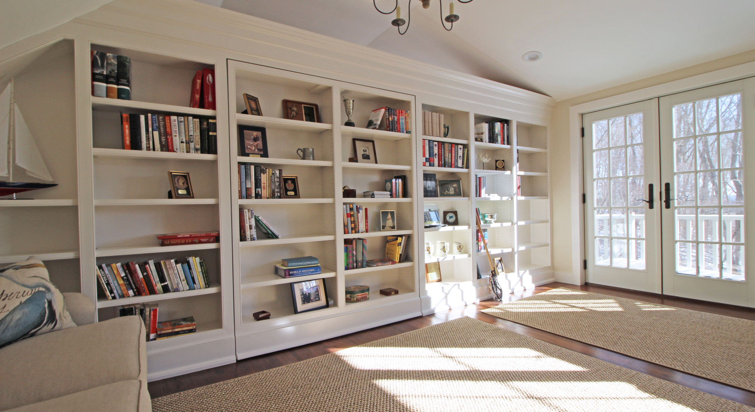 Rotating bookshelf wall