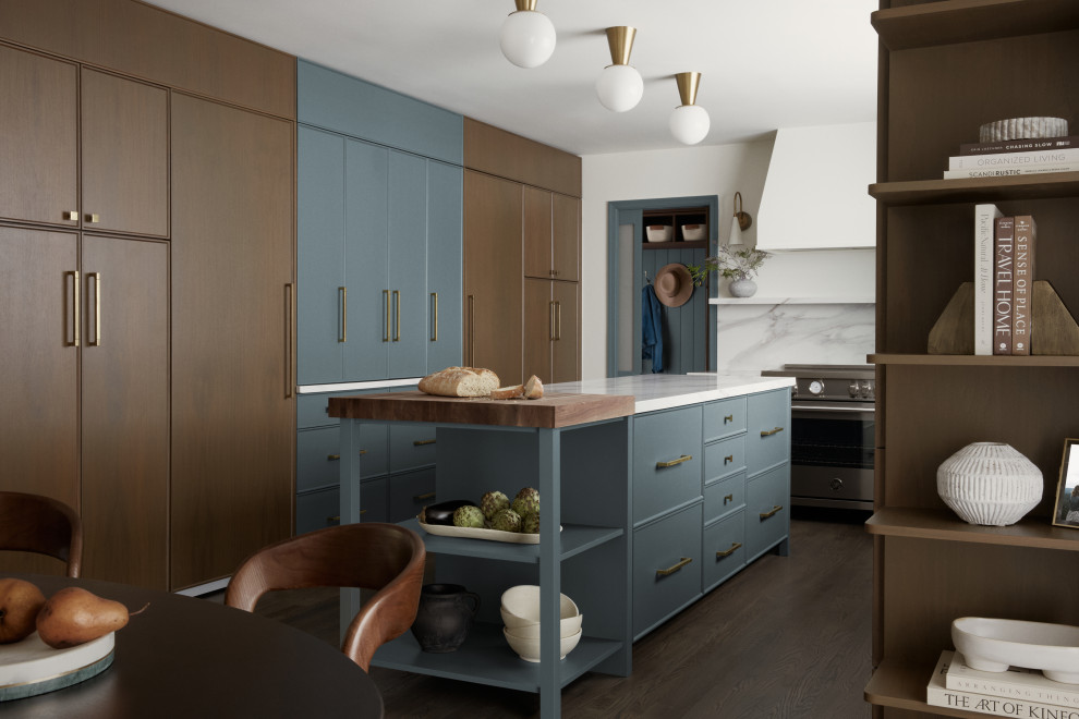 Mid-sized transitional u-shaped dark wood floor and brown floor eat-in kitchen photo in DC Metro with a single-bowl sink, flat-panel cabinets, medium tone wood cabinets, quartz countertops, white backsplash, quartz backsplash, paneled appliances, an island and white countertops