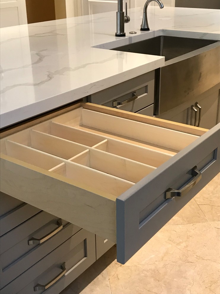 Large transitional kitchen photo in Miami with a farmhouse sink, shaker cabinets, white cabinets, quartz countertops, gray backsplash, glass tile backsplash, stainless steel appliances, an island and multicolored countertops